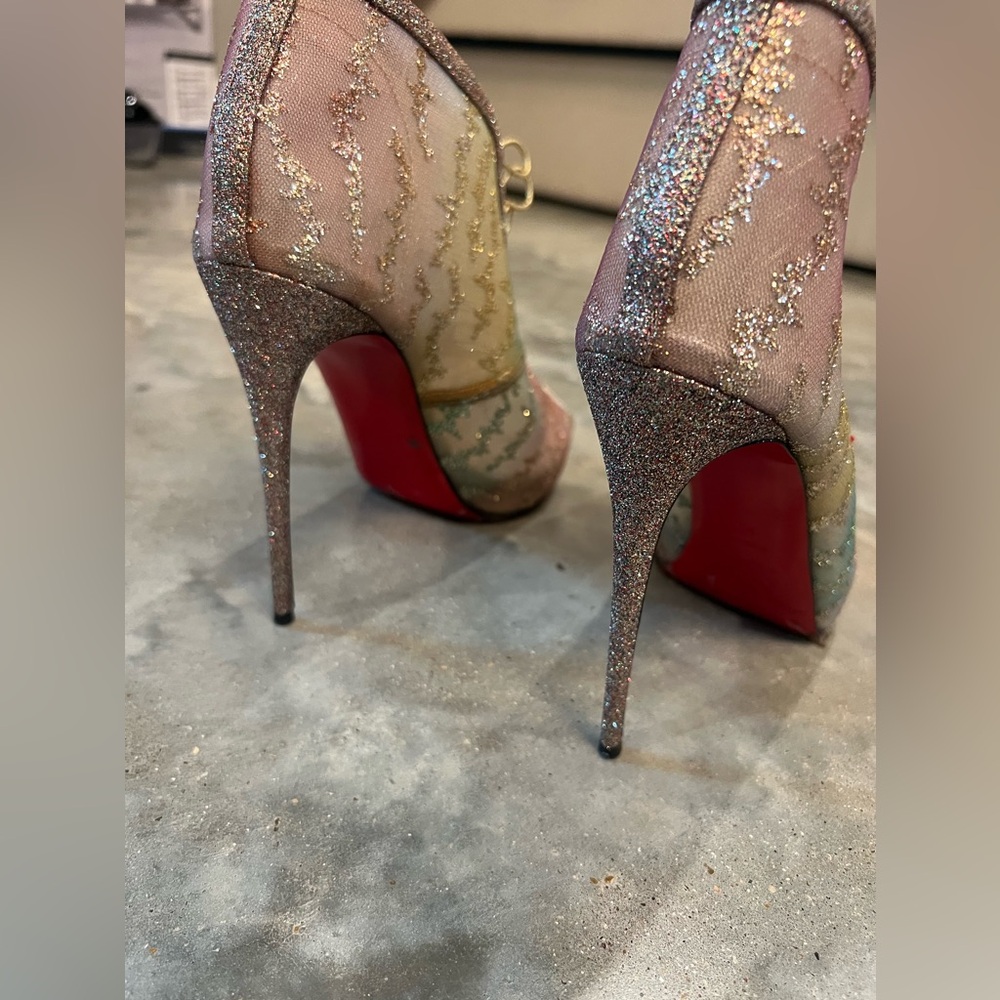 Authentic Christian Louboutins iridescent buckle up heels